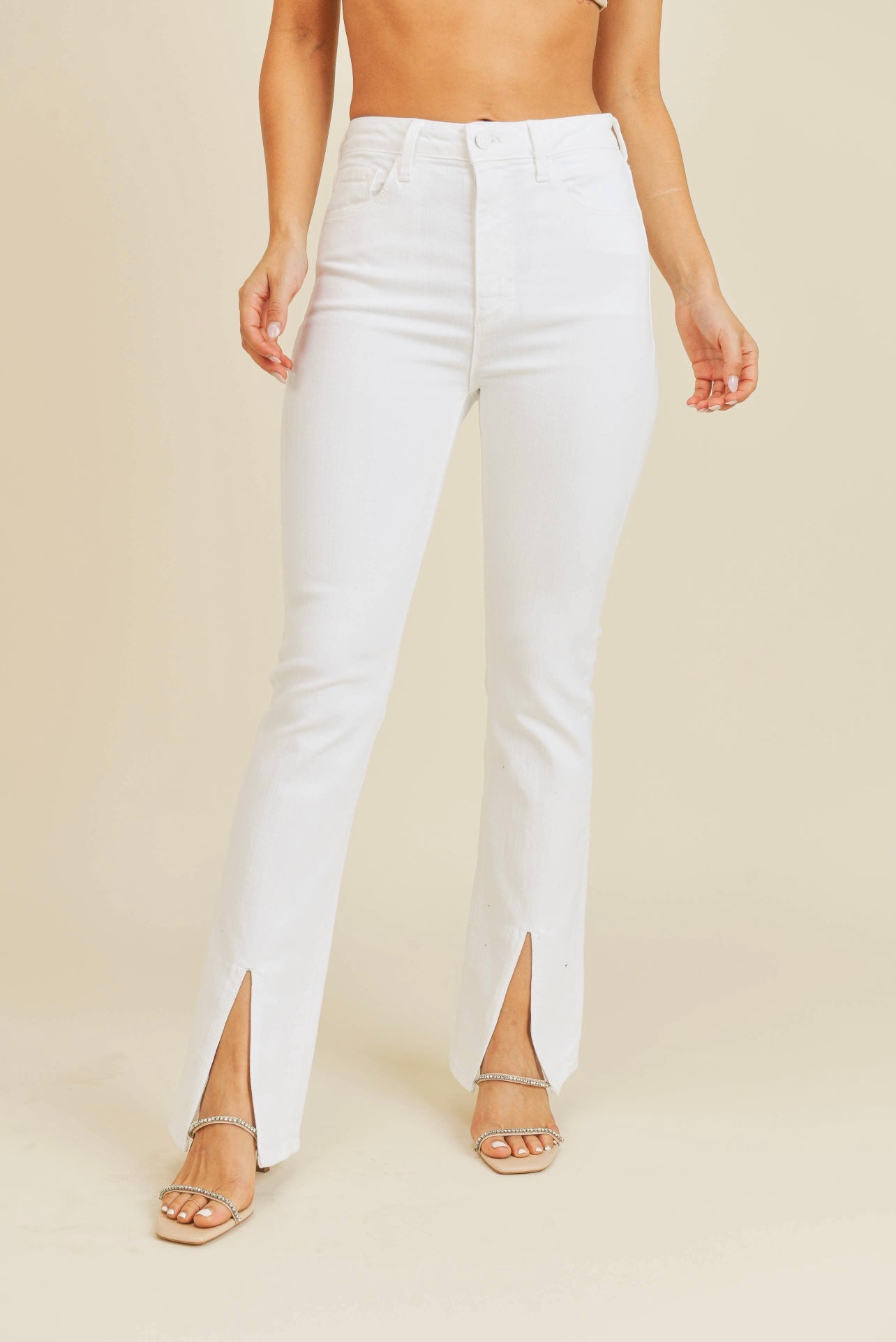High rise white pants with front slit opening at feet
