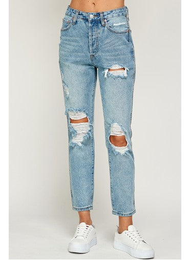 High waisted mom jeans with stylized rips and tears in the knees and below pocket