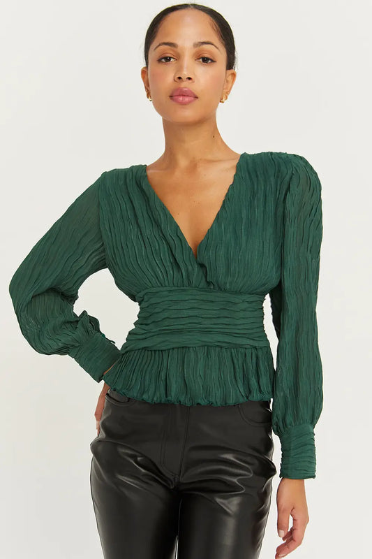 Green V-neckline, Poet long sleeves, Sleeve button cuff, Lined in the chest area and waist, Back keyhole, Ruffle detail at bottom hem